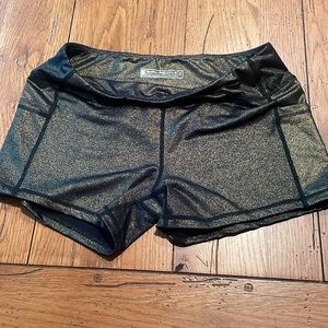 Born Primitive booty shorts.  Gold and black sparkle.  Size Large. Pockets. EUC